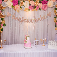 Helewilk French-theme baby shower bunting decor enhances welcome.