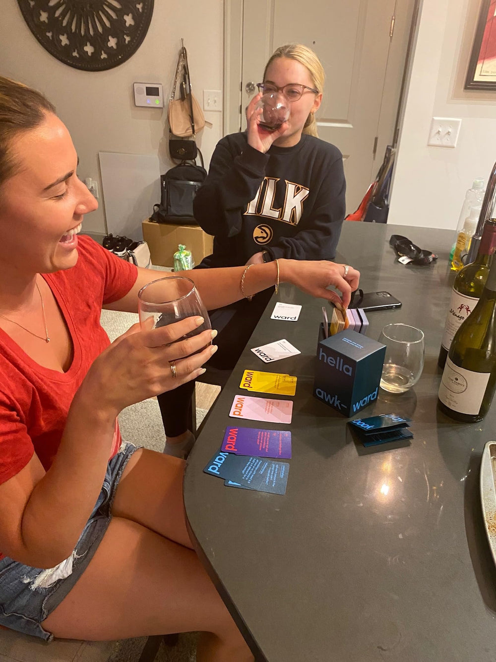 Hella Awkward card game date night setup sparks connection and fun