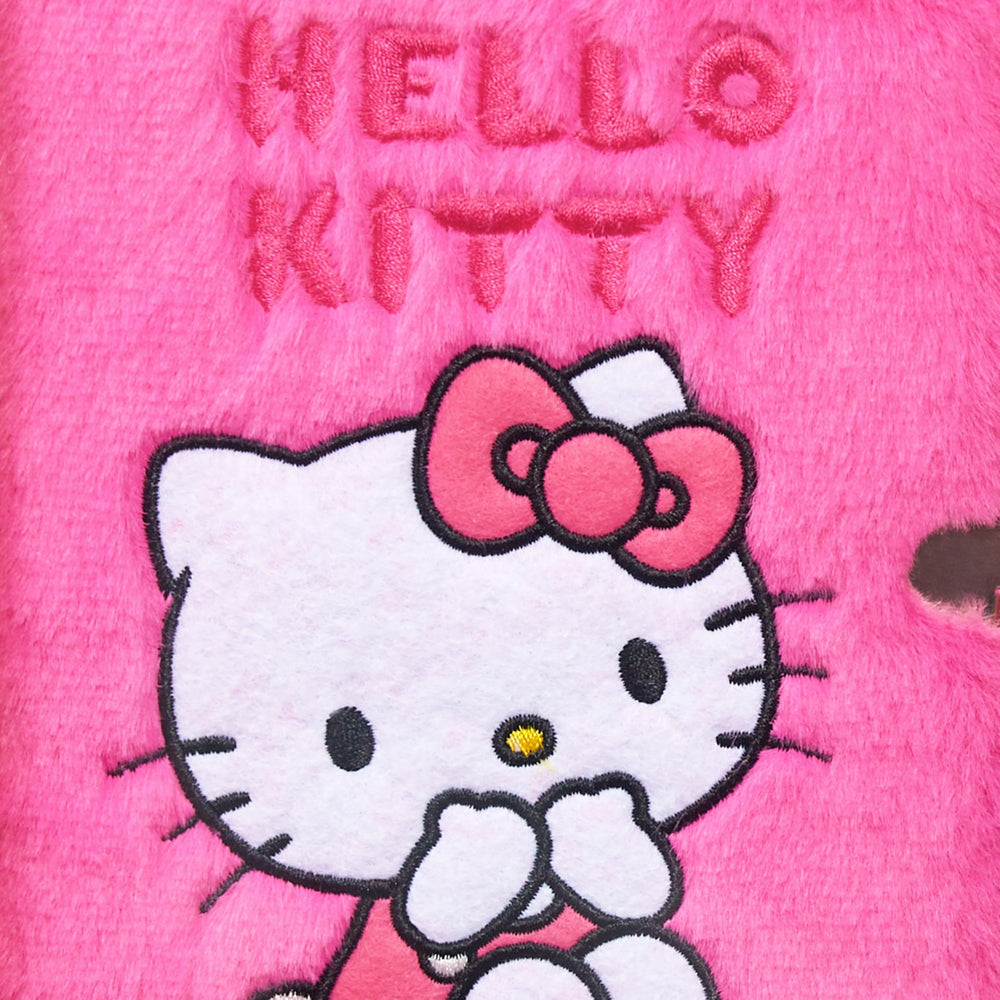 Hello Kitty notebook with smooth ballpoint pen for effortless writing.