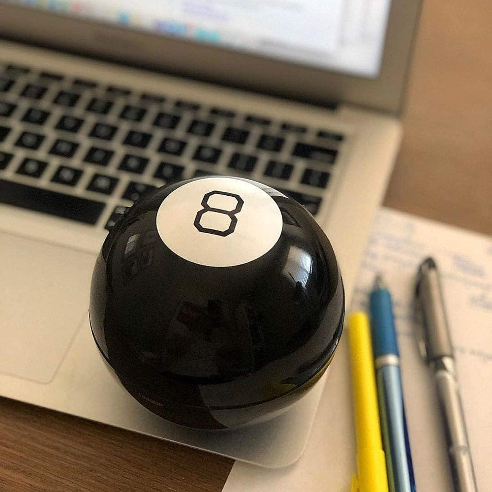 Helvak Mystic 8 Ball in use during a casual moment as a conversation starter.