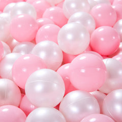 Vibrant pink and pearl white Heopeis balls for color recognition