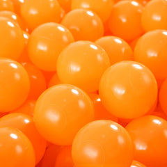 Heopeis orange balls used to create patterns and early motor skills.