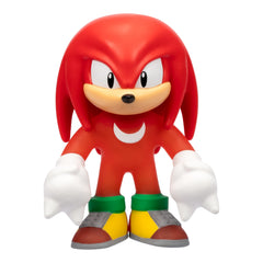Heroes of Goo Jit Zu Unstoppable Surge Knuckles glowing with Glow Surge in dark play