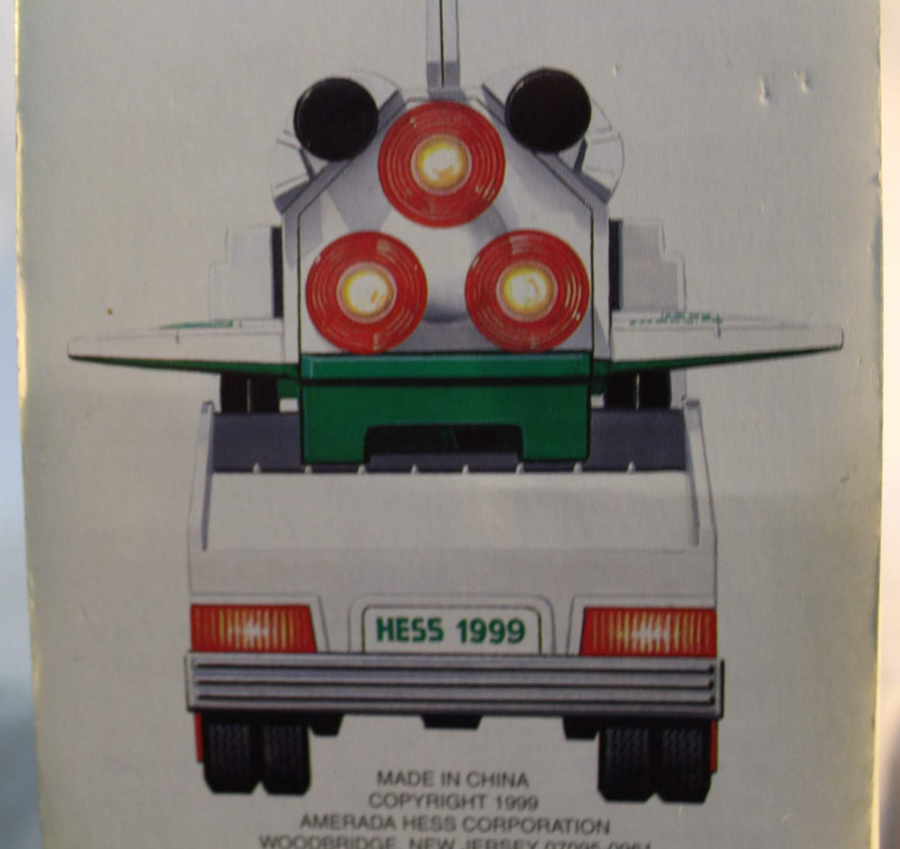 Hess 1999 packaging artwork image focuses on vintage branding for collector appeal.