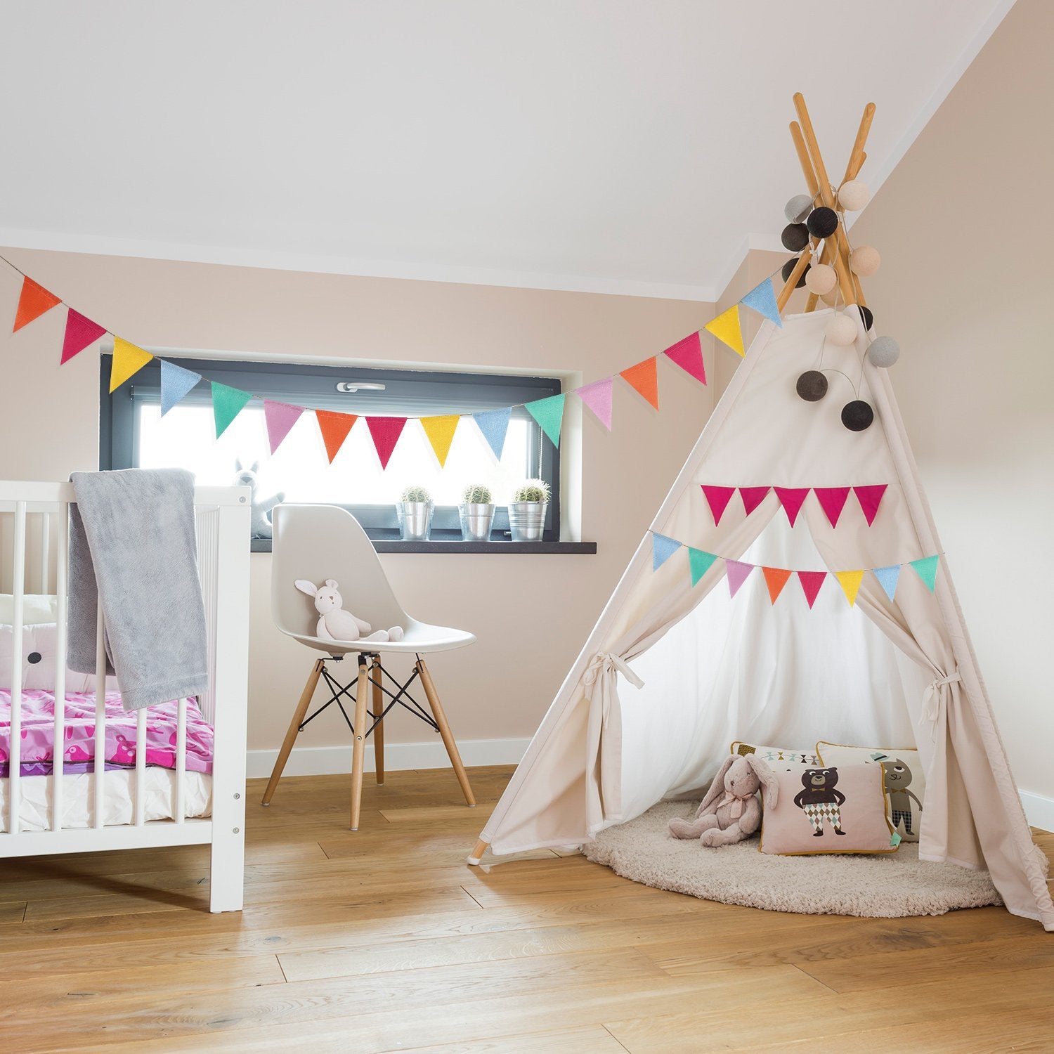 HESTYA pastel pennant banner on tent or wall setting.