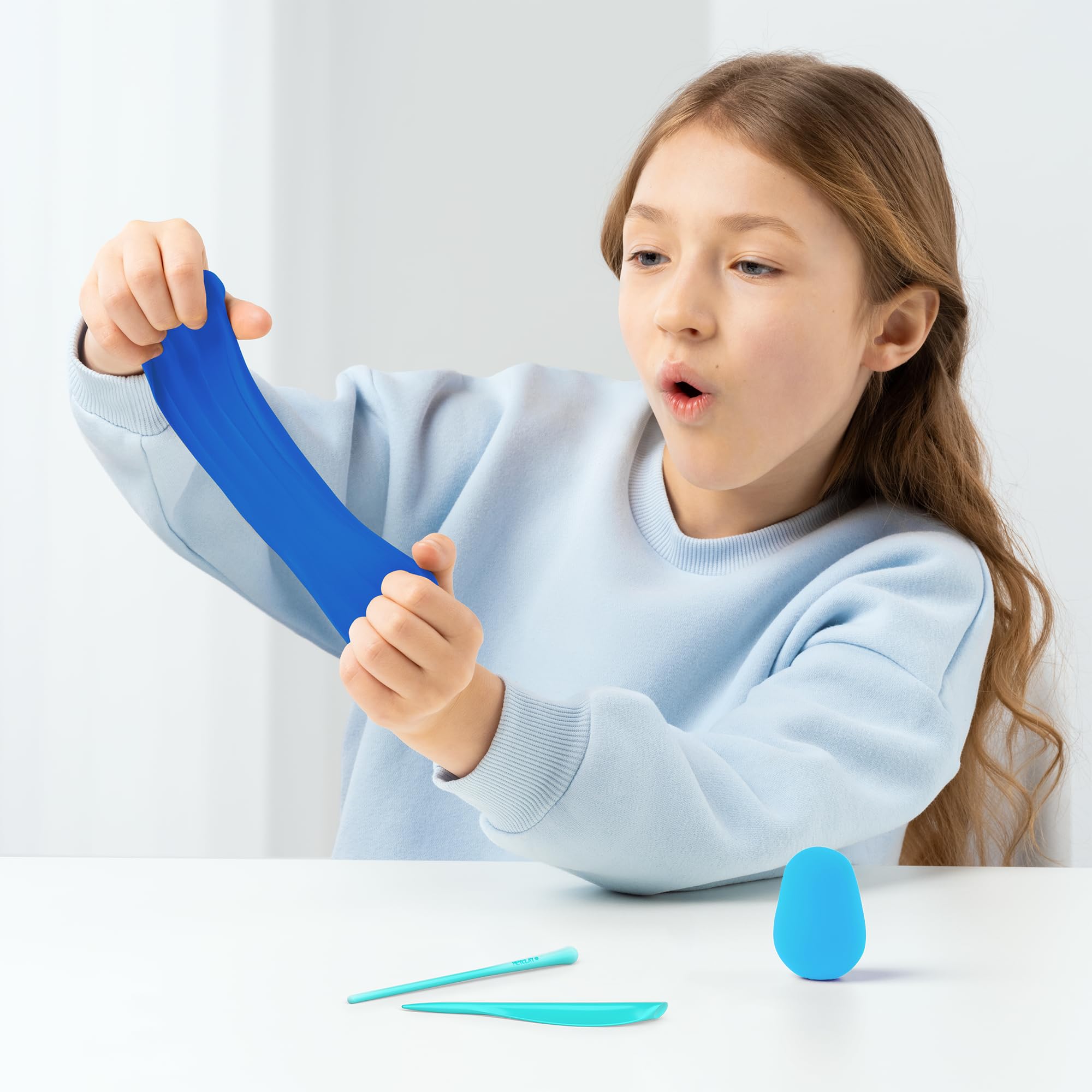HEY CLAY kids crafting session featuring Bluey characters for creative play