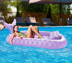 HeySplash inflatable tanning lounger purple, side view, dual cup holders for drinks.