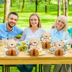 Hiboom bear honeycomb centerpiece on a gift table for celebration