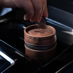Hide & Drink compact coin purse in pocket demonstrates portable organization