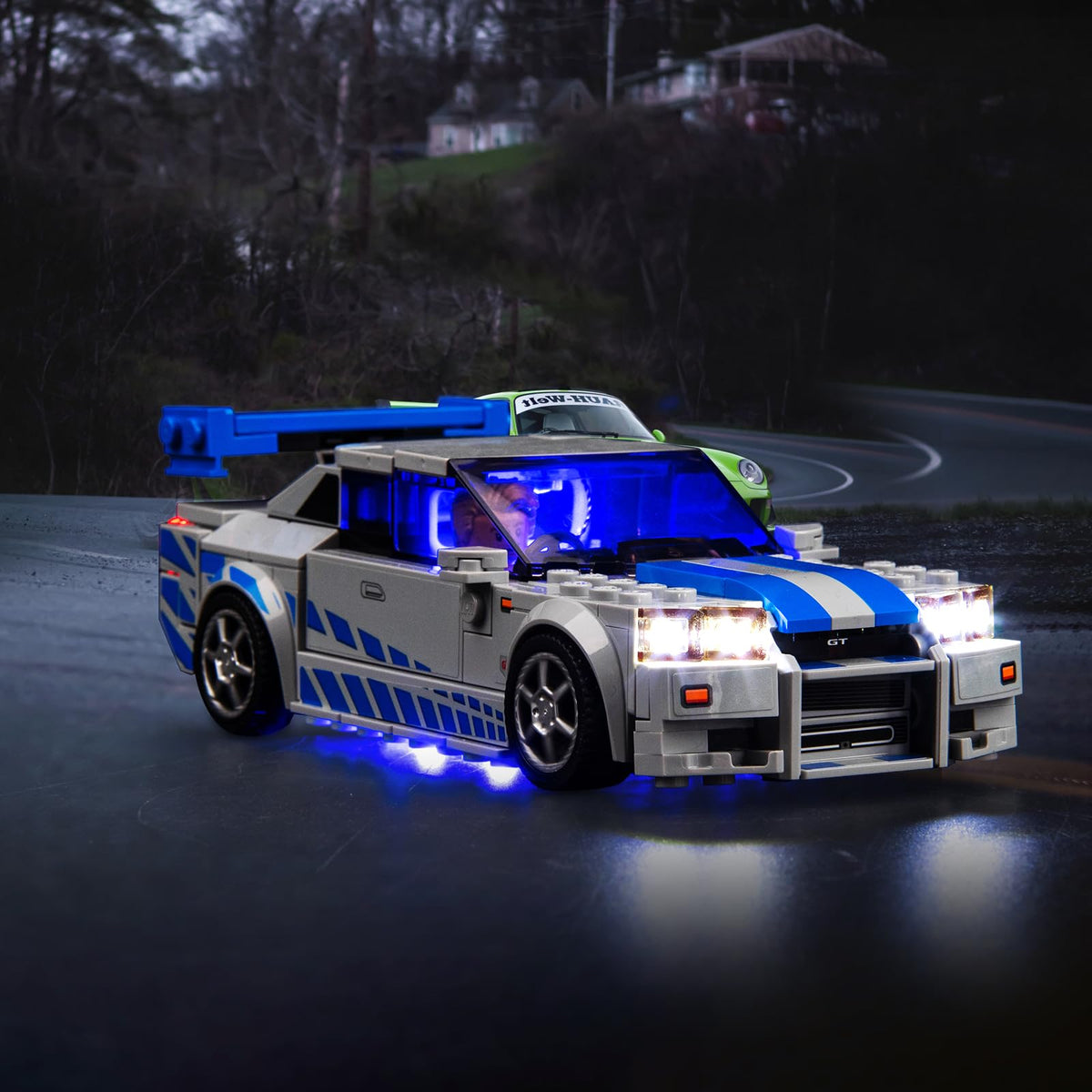 Hilighting LED light kit on Nissan Skyline R34 model, showcasing vibrant illumination.