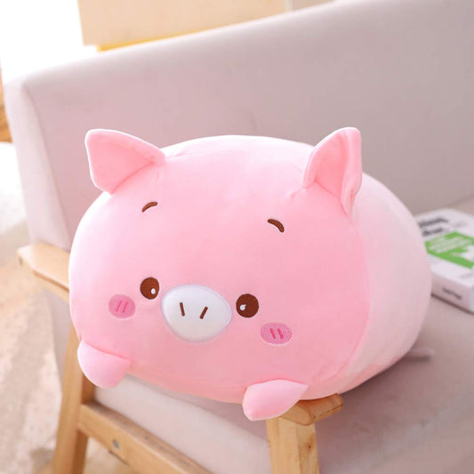 Hitoshe pig plush side view highlights compact size for travel and desk cuddling