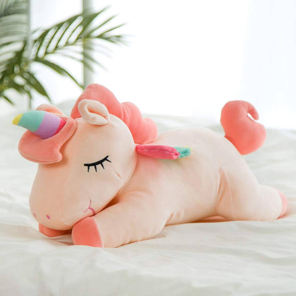 Hitoshe unicorn plush with rainbow wings adding playful decor and comfort