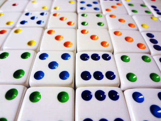 Hobby Monsters white D6 dice with multi-colored pips, ideal for teaching probability