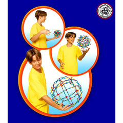 Hoberman Expanding Mini Sphere on desk as kinetic art.