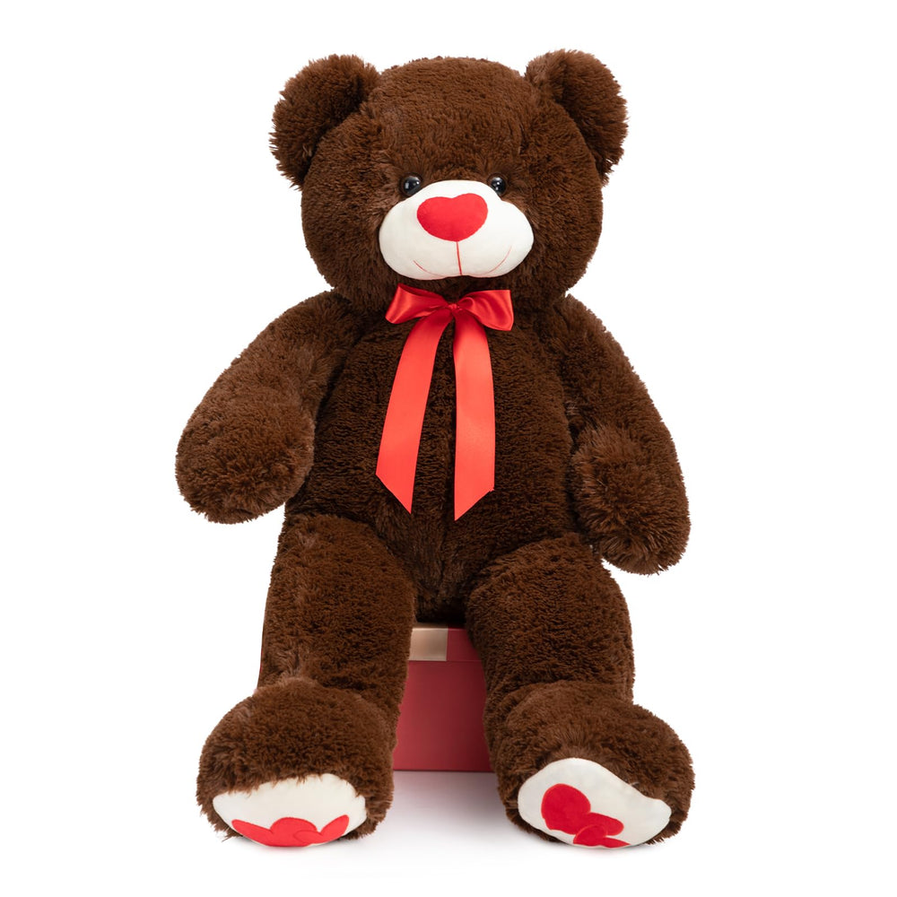 HollyHOME teddy bear enhances bedroom decor with warm chocolate fur.