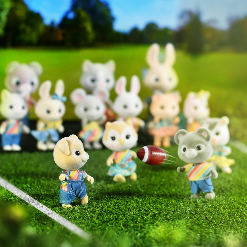 Honey Bee Acres Calvin dog figure with removable outfit promotes mix-and-match play.