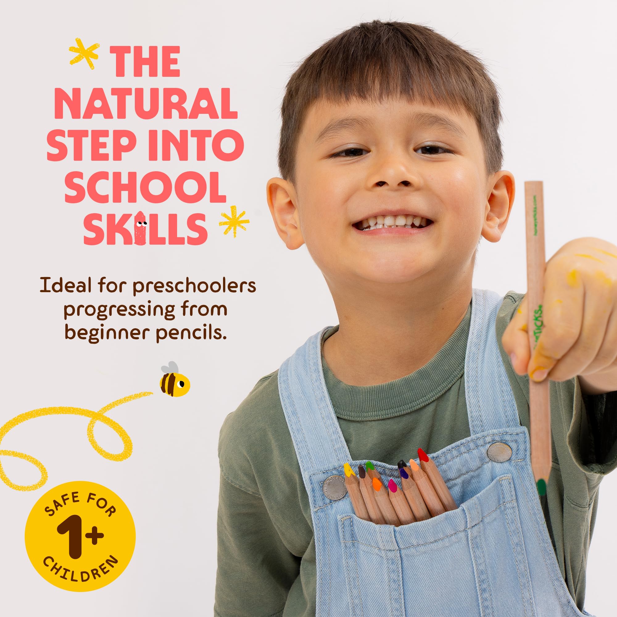 A child holds Honeysticks pencils showing easy triangle grip for small hands.