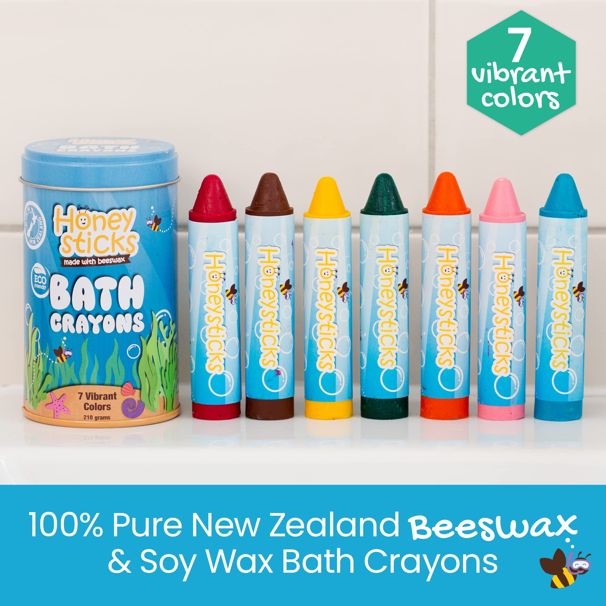 Honeysticks crayon held by baby hands during bath time.