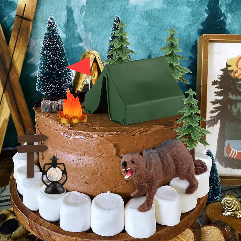 Hooqict camping cake toppers tree-2 enhances woodland backdrop for dessert table.