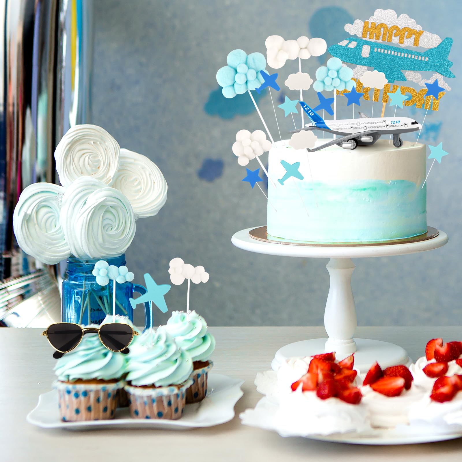 Hooqict airplane topper with sunglasses complements travel themed birthday decor.