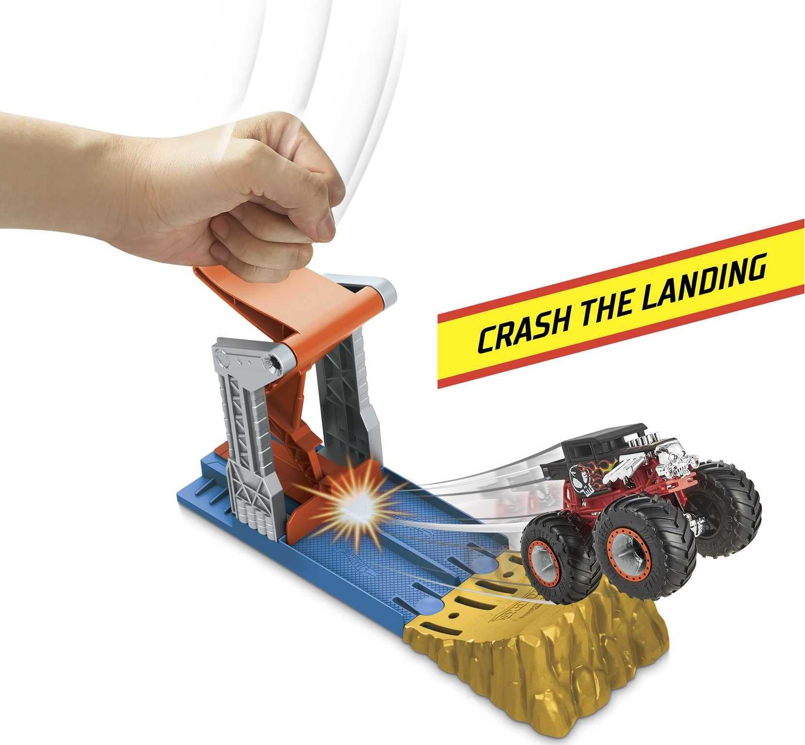 Hot Wheels 164-scale monster-truck in mid-air during a launch.