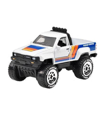 Hot Wheels 1987 Toyota Pickup Truck detailed exterior emphasizing rugged styling for display and play.