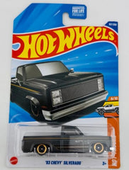 Hot Wheels 83 Chevy Silverado black diecast, ideal for display and collection