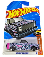 Hot Wheels 1983 Chevy Silverado Black Widow in 1:64 scale, ideal for display and collection.