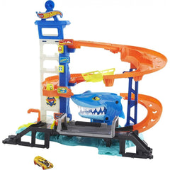 Hot Wheels Attacking Shark Escape Playset shows a shark attack under the city garage for thrilling play