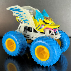 Hot Wheels Battitude on a track-style surface suggests action.