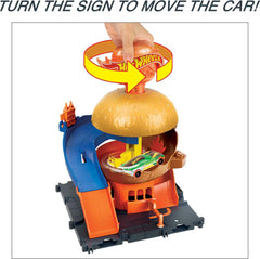 Hot Wheels Burger Drive-Thru ketchup diverter adds interactive movement for pretend dining.