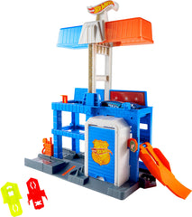 Hot Wheels City Downtown Police Tower elevator action facilitates multi-floor play scenarios.