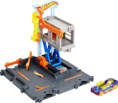 Hot Wheels City Downtown Repair Station lift lets kids inspect undercarriage during imaginative repairs.