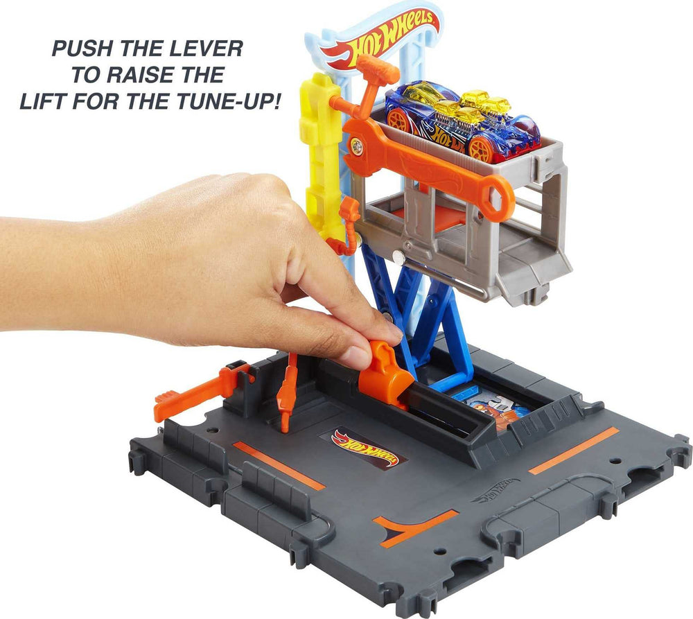 Hot Wheels City repair station undercarriage view supports pretend diagnostics.