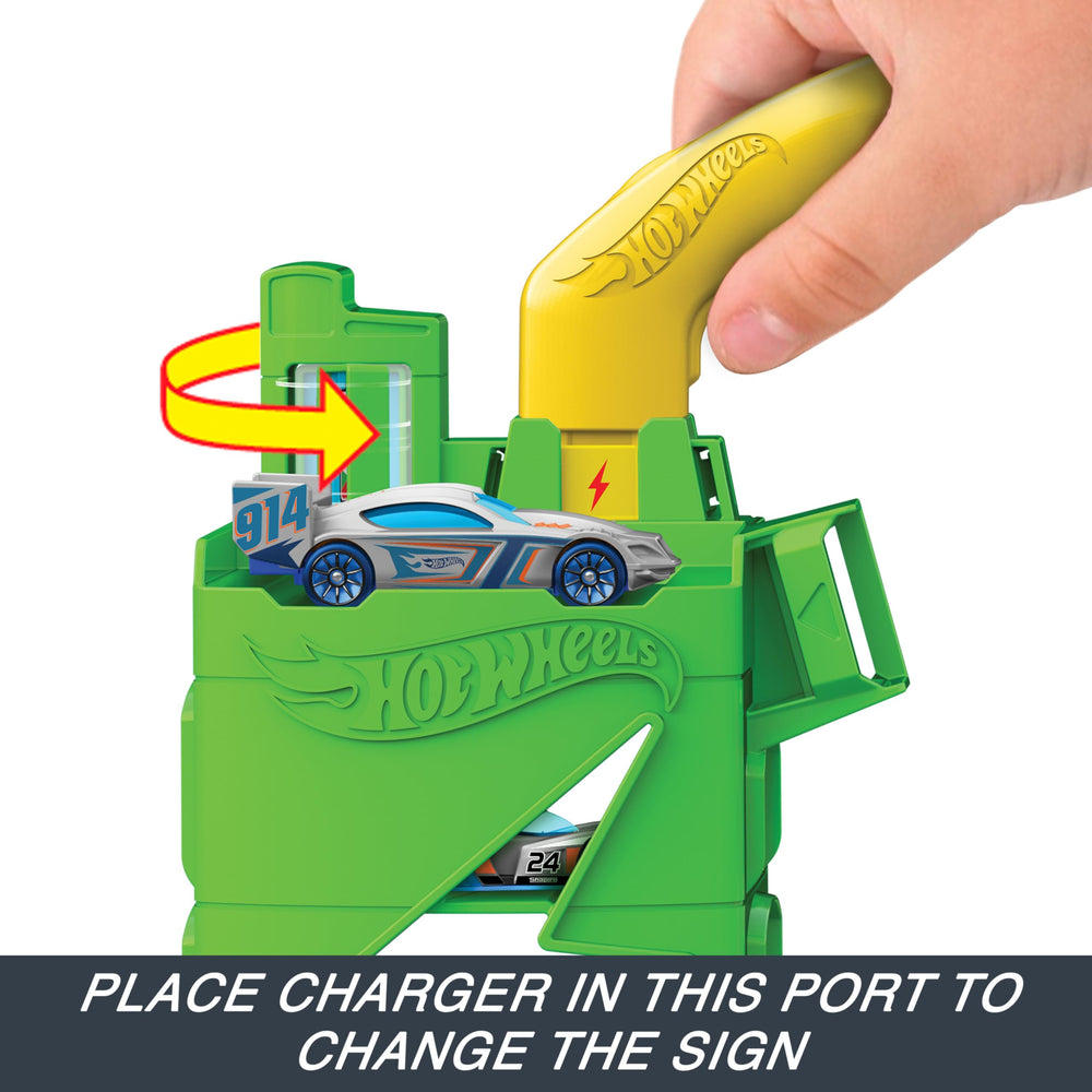 Hot Wheels City Super Recharge Fuel Station sign flip adds visual variety.