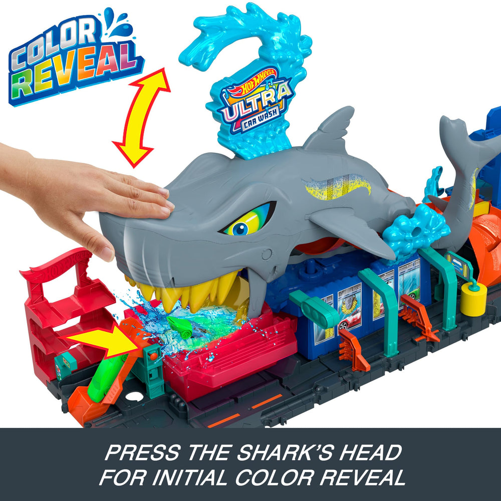 Hot Wheels Color Reveal vehicle inside shark mouth shows color-change excitement.