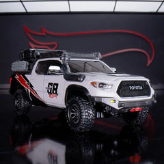 Hot Wheels Elite 64 Mod Shop 17 Tacoma interior detail showcases black seats and controls.