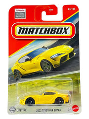 Hot Wheels Match Box 2023 Toyota GR Supra in yellow for imaginative play and display.