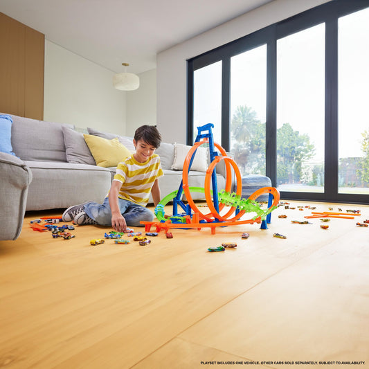 Hot Wheels motorized booster powers cars through loops for nonstop action.