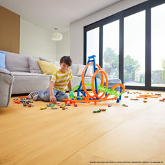 Hot Wheels motorized booster powers cars through loops for nonstop action.