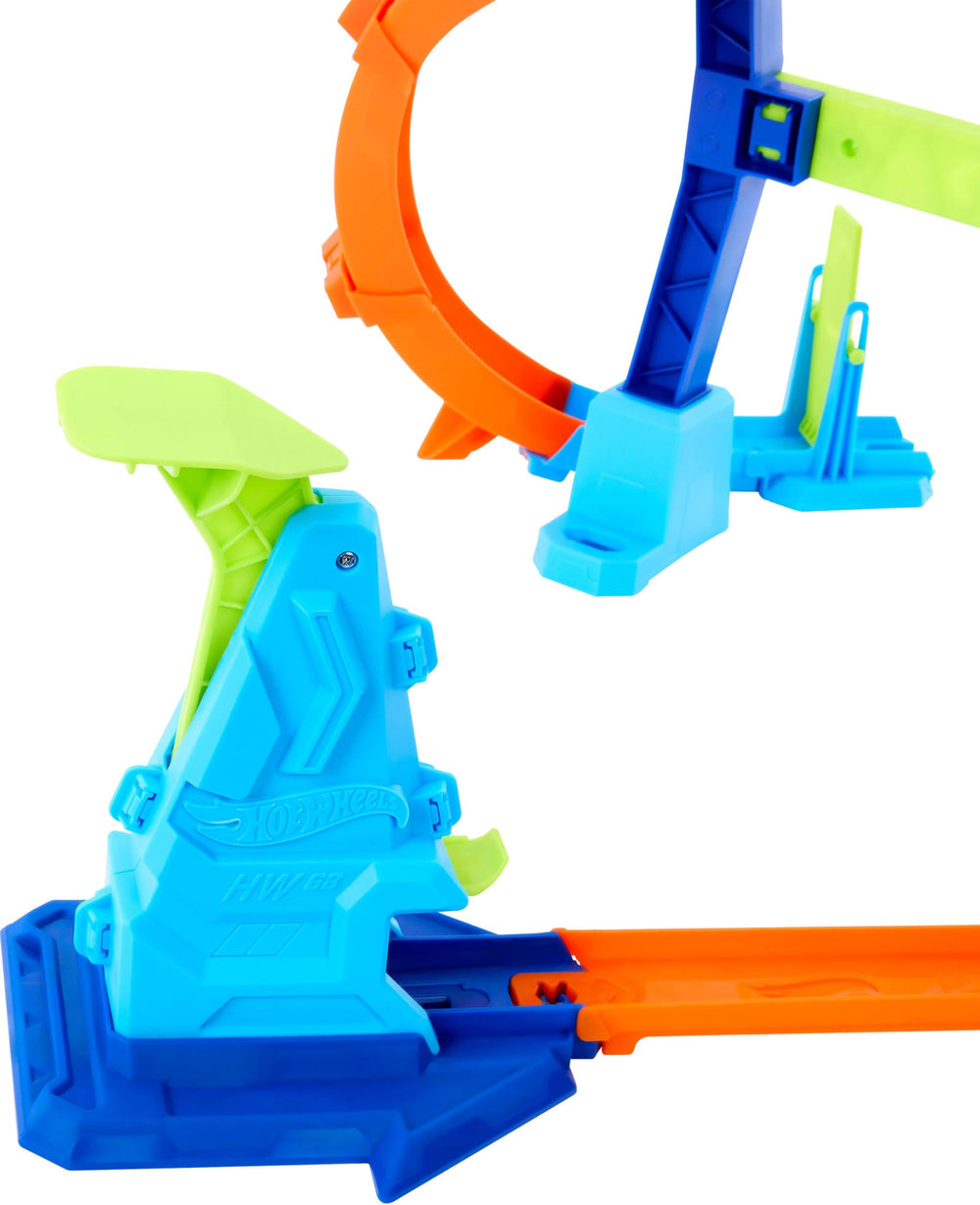 Hot Wheels one-sixty-four-scale die-cast car included for immediate racing.