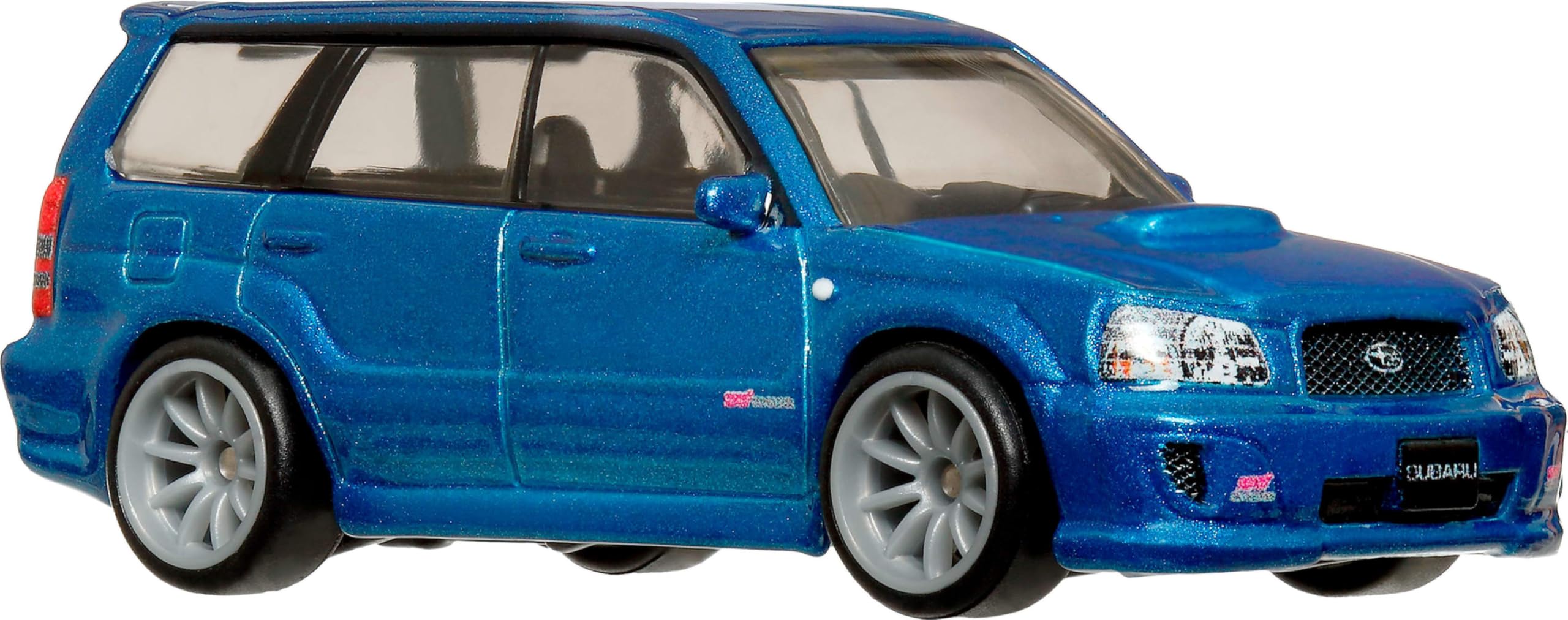 Hot Wheels Subaru Forester STI side view highlights precise decals and sleek silhouette.