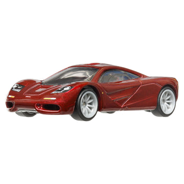 Hot Wheels McLaren F1 1:64 side view highlights Real Riders tires for collectors.