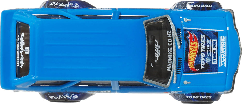 Hot Wheels Premium Car Culture packaging art, enhances shelf display.