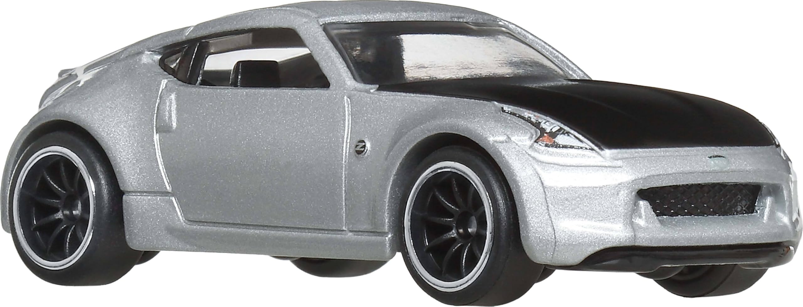 Hot Wheels Premium Fast-Furious 1:64 car side view highlights vivid decos for display.