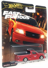 Hot Wheels Ford F-150 SVT Lightning red side view highlighting metal body durability for display