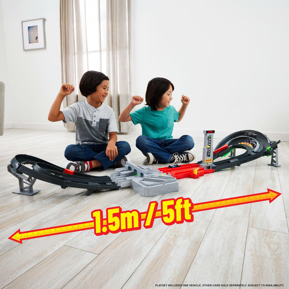 Hot Wheels three-lane booster system enabling simultaneous car action.