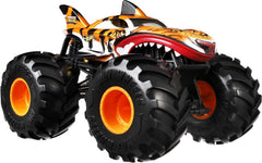 Hot Wheels Tiger Shark wheel close-up captures rugged tread and scale.