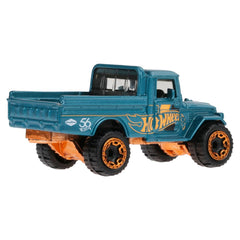Hot Wheels Toyota Land Cruiser teal and gold packaging card, ideal for display or gifting.
