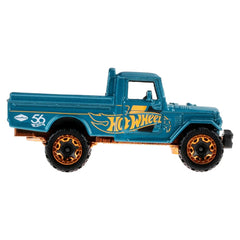 Hot Wheels Toyota Land Cruiser teal and gold wheels detail, authentic accents for collectors.